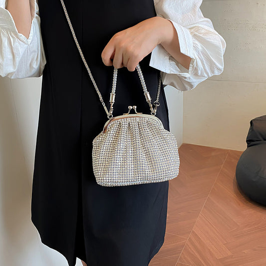 Sparkling diamond-studded women's handbag