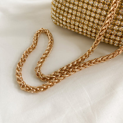 Sparkling diamond-studded women's handbag